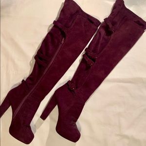 Thigh High Purple Heel Boots.